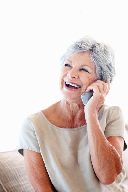 istock Woman chatting on cordless phone 183782294
