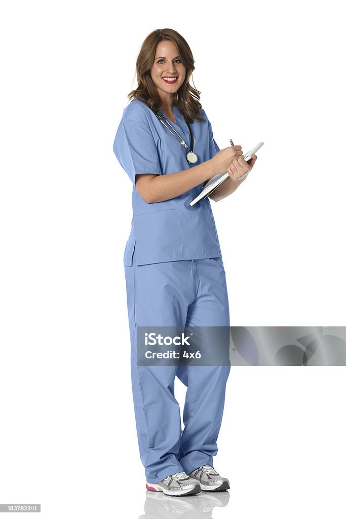 여성 간호사 쓰기 한 메모장 - 로열티 프리 간호사 스톡 사진