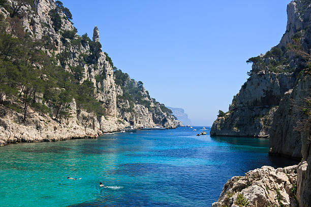 Marseille, France - June 9, 2024 : Calanque of Marseille on the Coast of Provence, Calanques National Park seen from an excursion boat cruising, High quality 4k footage
