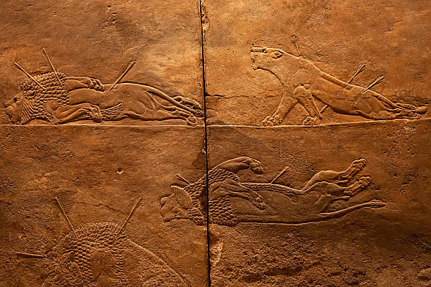 Lions hunting in ancient Assyria stock photo