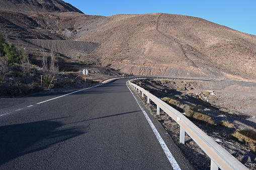 Pájara, Fuerteventura, Spain, November 24, 2023 - Winding road between Pájara and Tuineje, Fuerteventura, Canary Islands, Spain.