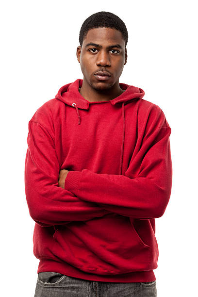 istock Serious Tough Young Man Staring At Camera With Arms Crossed 183783785