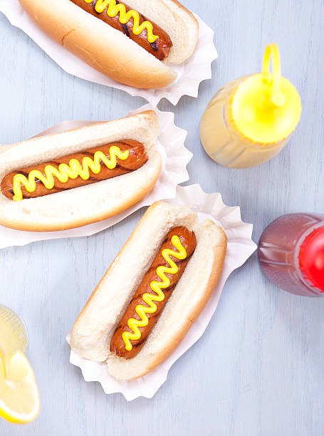Three hot dogs stock photo