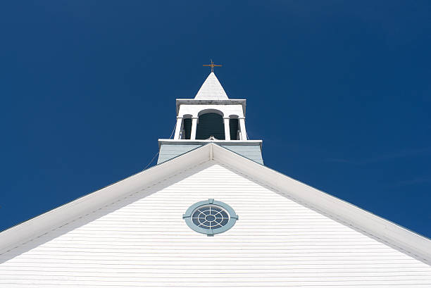 istock church bell tower on blue sky 183784276