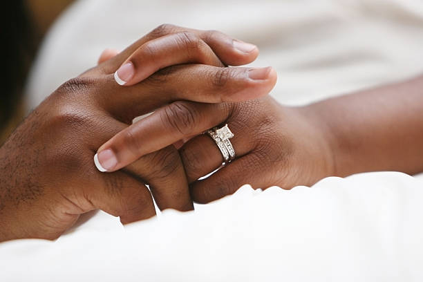 istock Clasped Hands of Bride and Groom 183784423