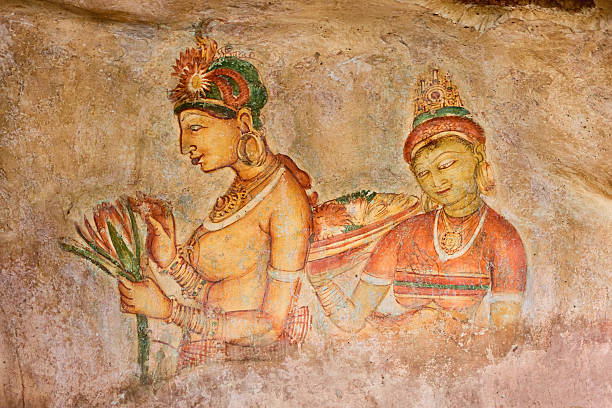 Ancient fresco in the cave temple, Sigiriya, Sri Lanka Ancient cave paintings in Sigiriya, Sri Lanka. http://bem.2be.pl/IS/sri_lanka_380.jpg dambulla stock pictures, royalty-free photos & images