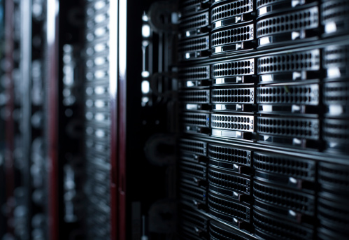 Abstract shot of hundreds of computers in a large-scale datacenter