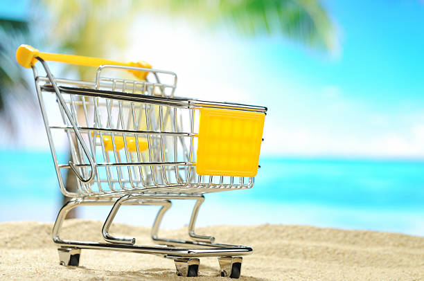 istock Shopping cart on the beach 183784595