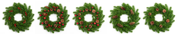 istock isolated christmas wreath and red balls on white 1837855912