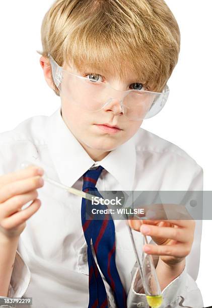 Young Scientist Doing A Chemistry Experiment Stock Photo - Download Image Now - 8-9 Years, Boys, Button Down Shirt