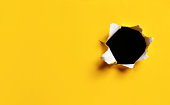 Yellow Torn Paper hole, horizontal