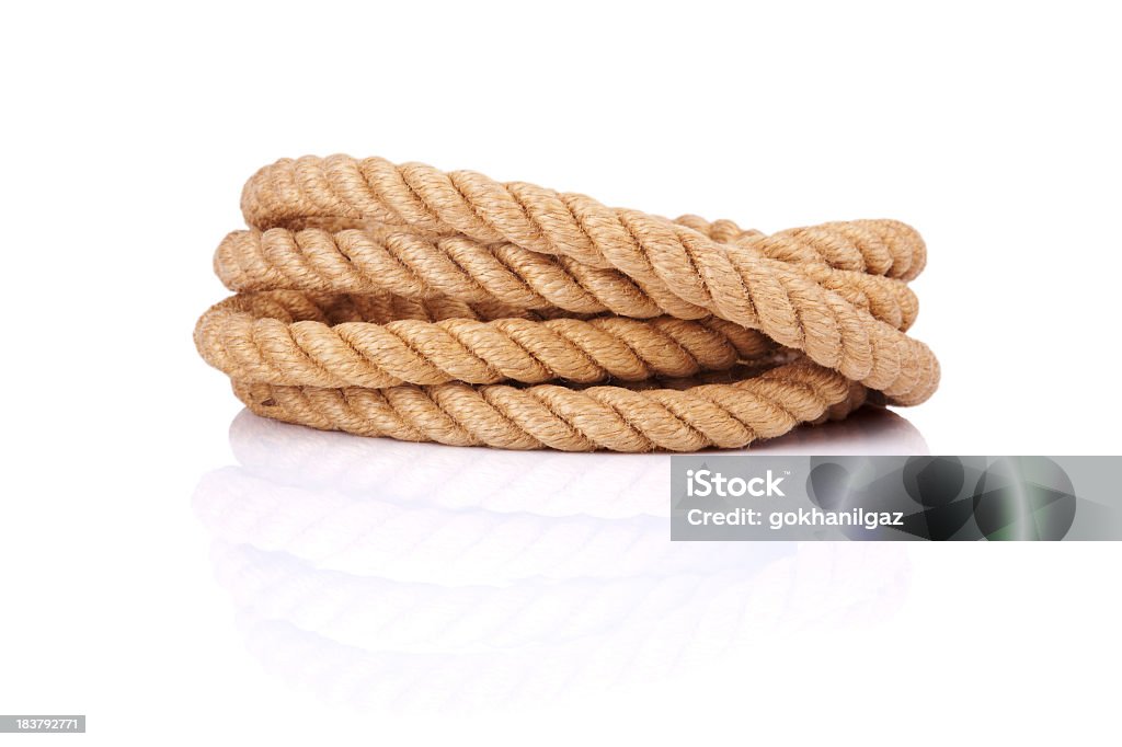 Coiled rope isolated on a white background Old rope isolated on white Rope Stock Photo