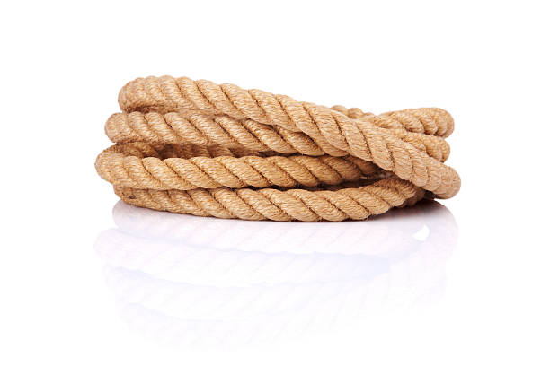 Coiled rope isolated on a white background stock photo