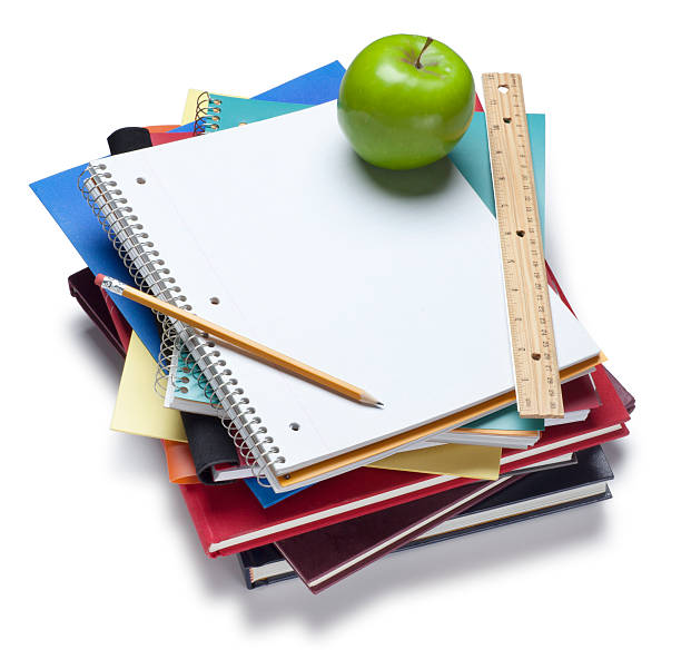 zurück to school - textbook book apple school supplies stock-fotos und bilder