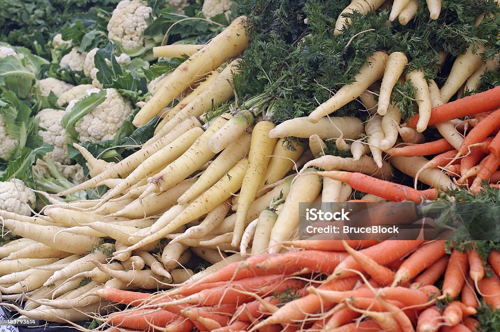 Farmer's Market Vegetables cauliflower and white and orange carrots at the farmer's market Agricultural Fair Stock Photo