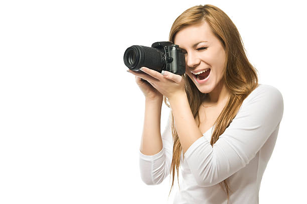 istock Click! - Young female photographer 183794440