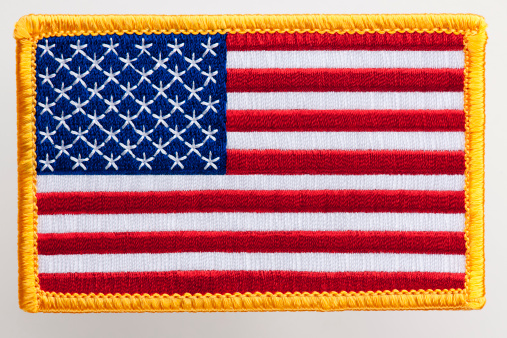 United States flag patch on white background.