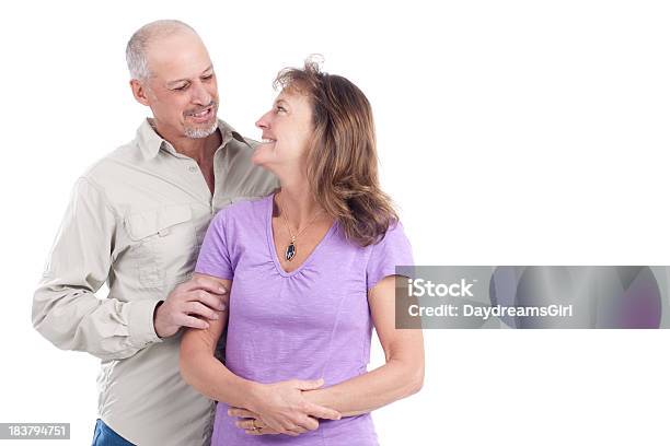 Foto de Atraente Feliz Casal e mais fotos de stock de Casal de Meia Idade - Casal de Meia Idade, Fundo Branco, 50 Anos