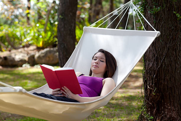 istock Woman Sitting In Hammock 183794812