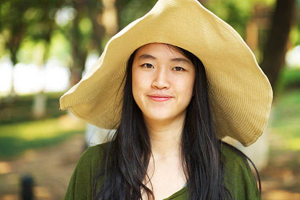 istock Asian girl wearing strawhat 183795081