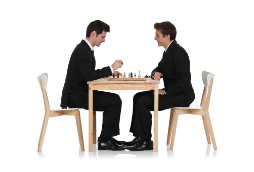 Two businessmen playing chesshttp://www.twodozendesign.info/i/1.png
