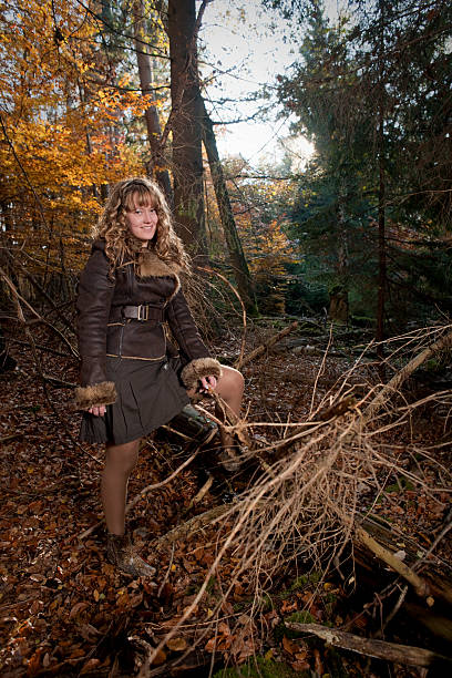 istock Young woman in forest 183795659