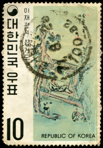 Cancelled stamp with drawing of ancient painting, scanned on black background. In aRGB colorspace for optimal printing.