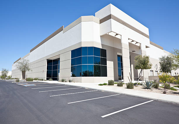 istock Newer white office building from street view  183796231