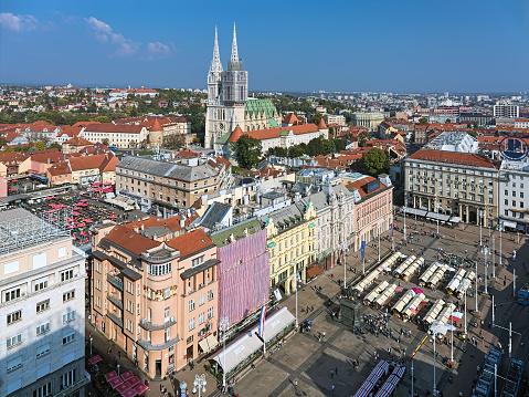 Zagreb, Croatia - October 10, 2018: High angle view over the historical part of the city with Zagreb Cathedral at the Upper Town and Ban Jelacic Square at the Lower Town. View from the observation desk of Zagreb Neboder (Skyscraper).