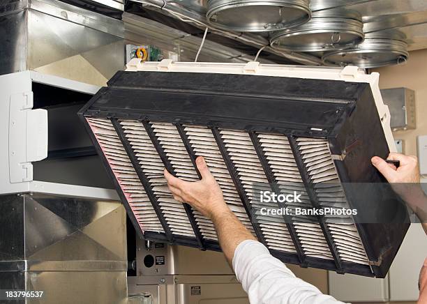 Whole House Air Cleaner Filter Installation Stock Photo - Download Image Now - Air Purifier, Air Conditioner, Air Duct