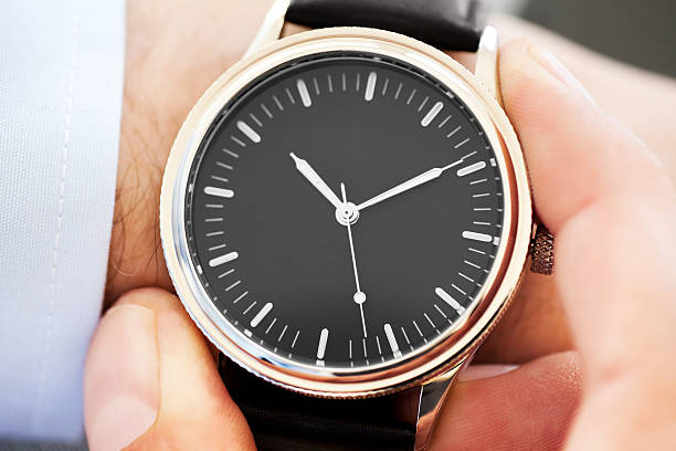 Businessman Checking Time