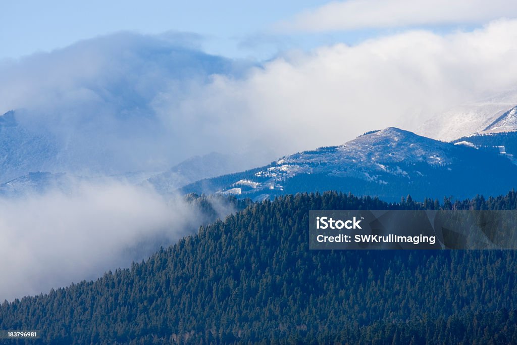 Cloudy Pikes Peak Pikes Peak shrouded in clouds on beautiful Colorado spring day. Colorado Stock Photo