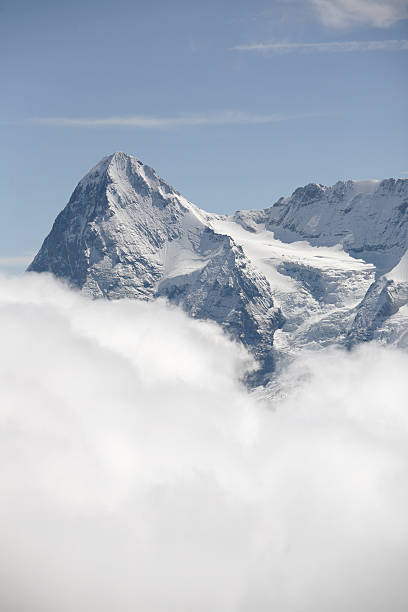 istock north and west faces, Eiger, Swiss Alps above the clouds 183797002
