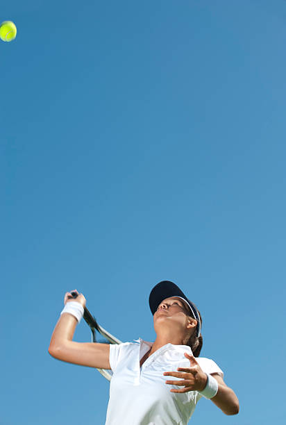 istock Female tennis player serving 183797230