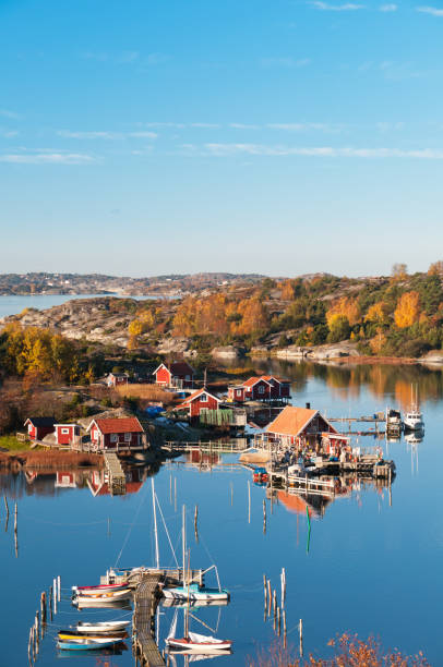 остров village - fishing village idyllic red cottage стоковые фото и изображения