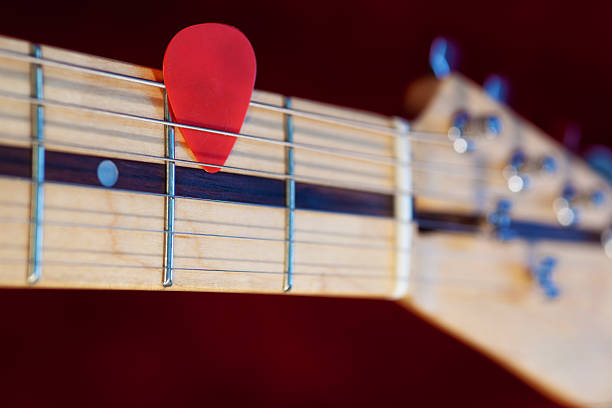 istock Guitar Fretboard with a Pick 183797881