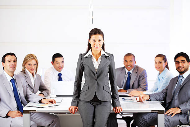 istock Large business group on meeting, looking at the camera. 183798301