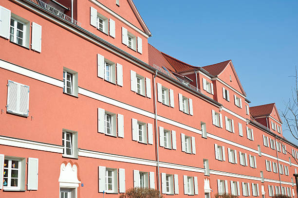 istock Condominium long red house in a row 183799008