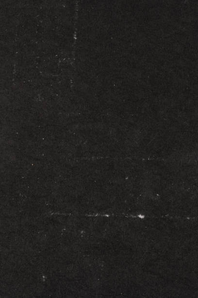 Dust and scratches black background paper texture background. Close up black paper texture background. Blank copy space abstract pattern effect surface level suit for wall paper screen saver, design. Dark, dirty, dust and scratches texture. poster stock pictures, royalty-free photos & images