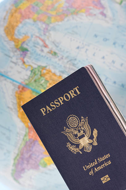 istock American Passport and globe in background 183799644