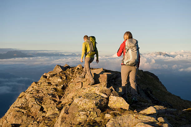 istock Hiker couple strolling on the mountain then 183799668