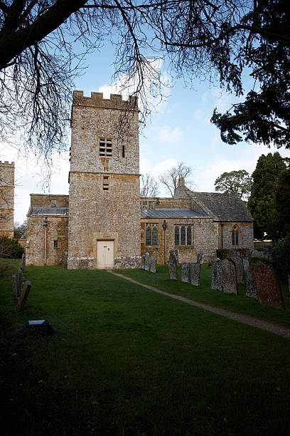 istock Old Cotswold church and graveyard 183799702