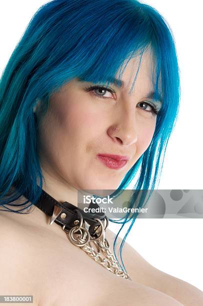 Blue Haired Model Smirking In Collar Stock Photo - Download Image Now - 20-29 Years, 25-29 Years, Adult