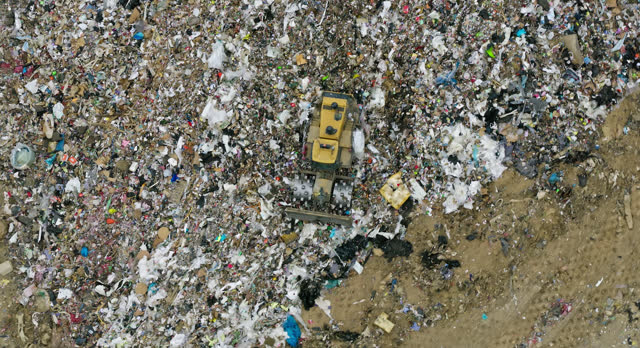 Overhead Aerial Shot of Bulldozer on Landfill in Ottawa County, Ohio