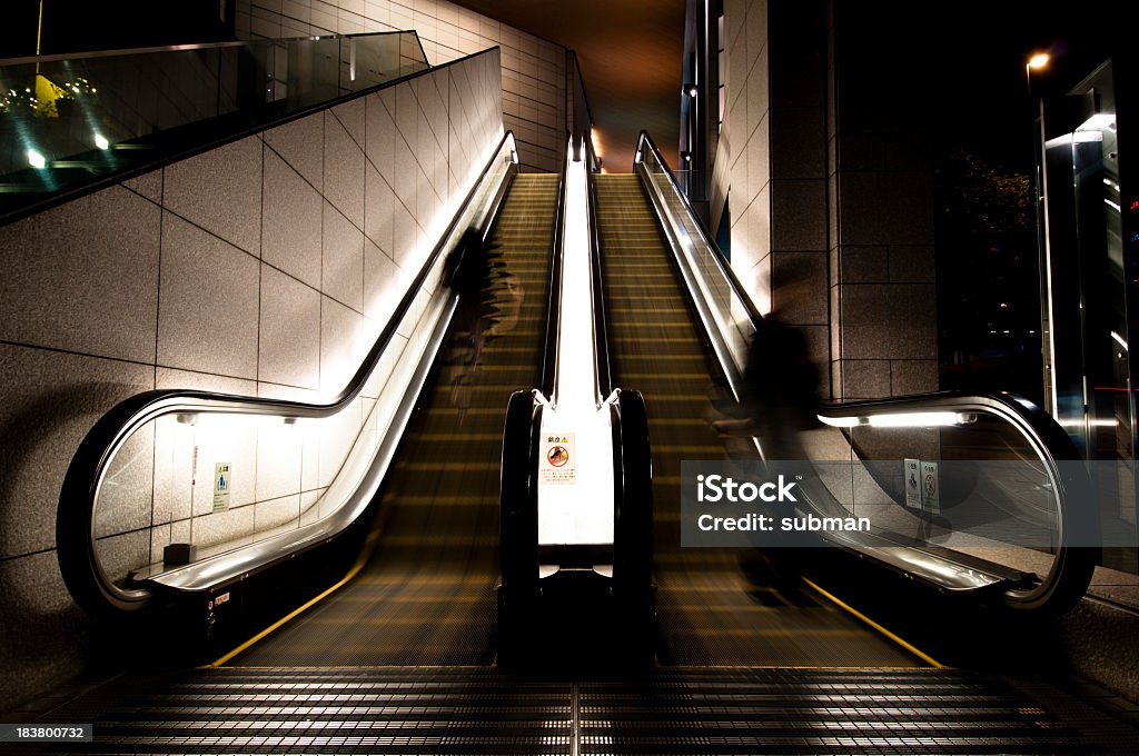 People on escalator People in Tokyo on elevator, long exposure, Tokyolypse 2010 Abstract Stock Photo