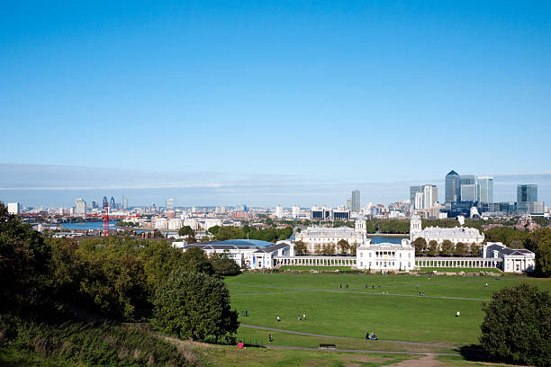 Canary Wharf, Greenwich and River Thames "Canary Wharf seen from the Royal Observatory, Greenwich, on a bright late summer day." queen's house stock pictures, royalty-free photos & images