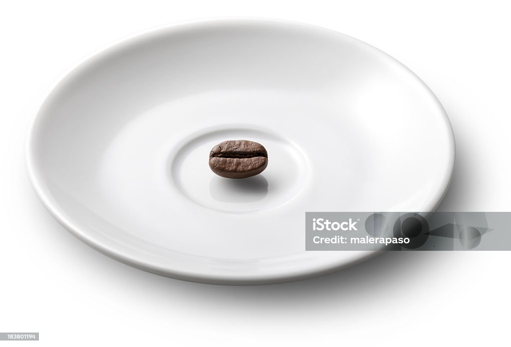 Coffee bean in a saucer Coffee bean in a saucer. To see more Coffee images click on the link below: Black Coffee Stock Photo