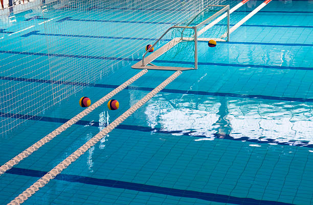 Water Polo Water Polo Balls and GoalSee more WATER PARKS and SWIMMING POOLS images here: water polo photos stock pictures, royalty-free photos & images