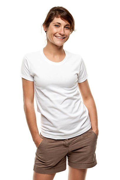 heureux souriant jeune femme portrait de trois-quarts - plain shirt photos et images de collection