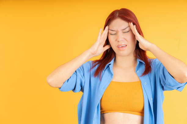 istock Young woman suffering from headache 1838016598